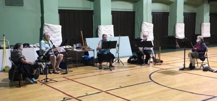 [socially distanced rehearsal]